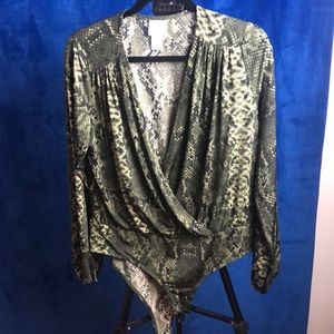 H&M snake skin body suit never worn.